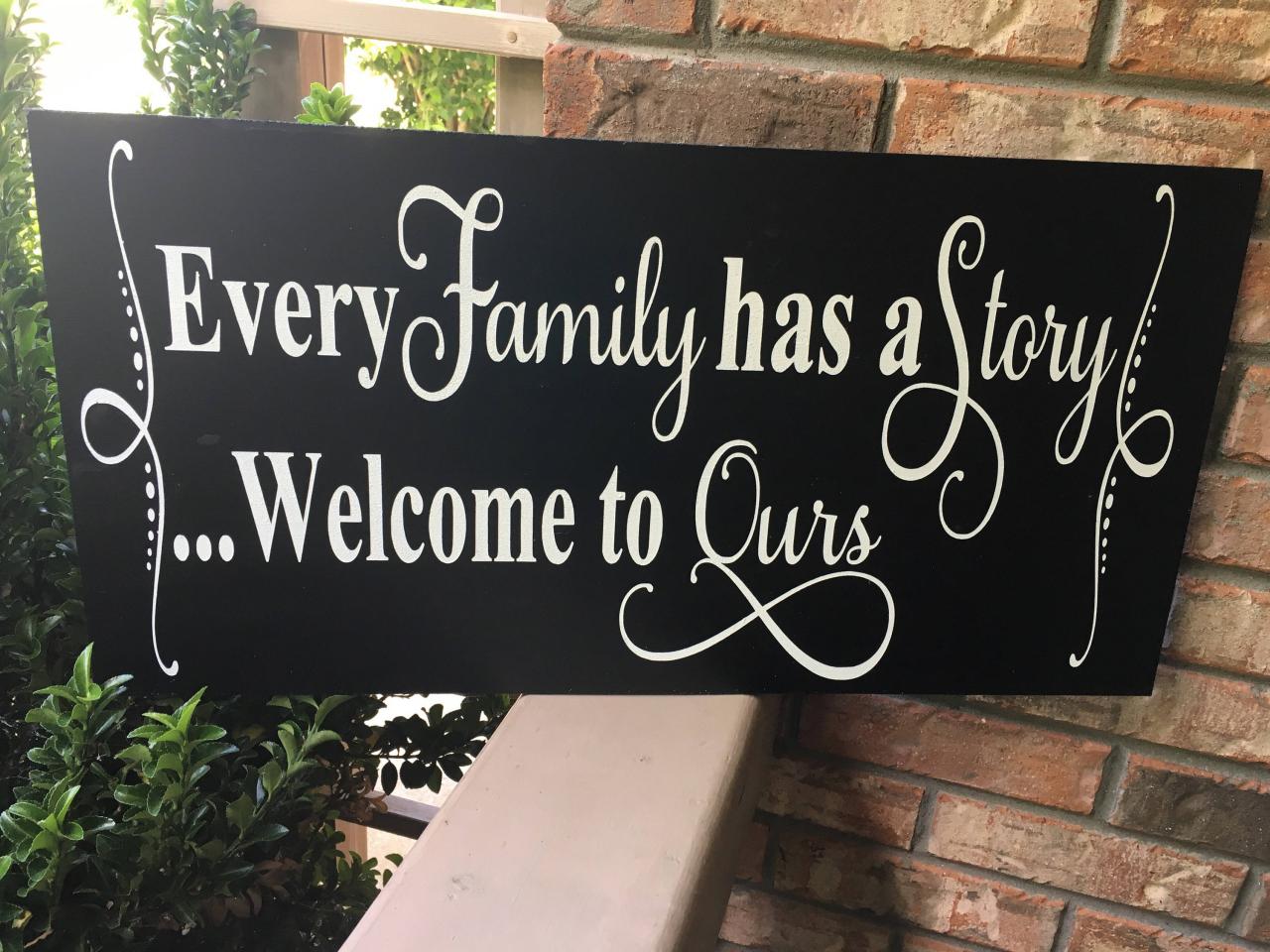 Every family has a story.. hand painted wood sign
