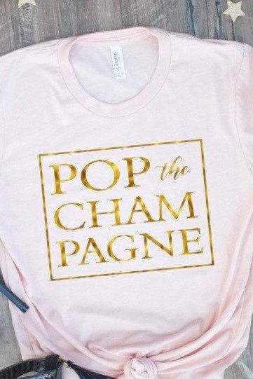 Pop the Champagne. New Years Shirt. New Years Eve shirt.Squad shirt. Favorite things. Screen Print. Graphic Tees. Bella Canvas.
