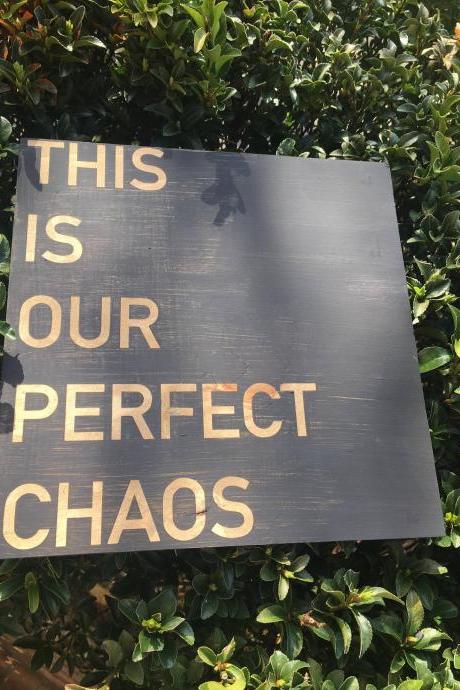 This is our perfect chaos 12x12 hand painted wood sign